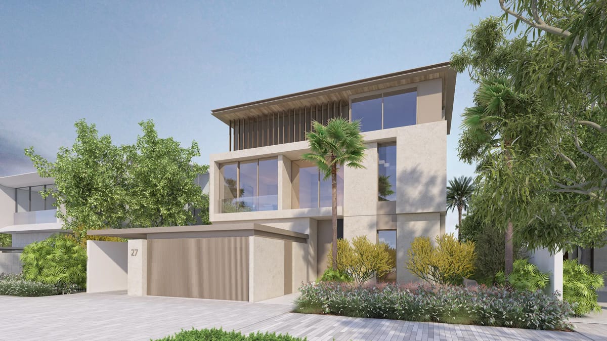 The street-side arrival elevation of the Wave Crest villa, in pale stone with a timber-clad upper storey.