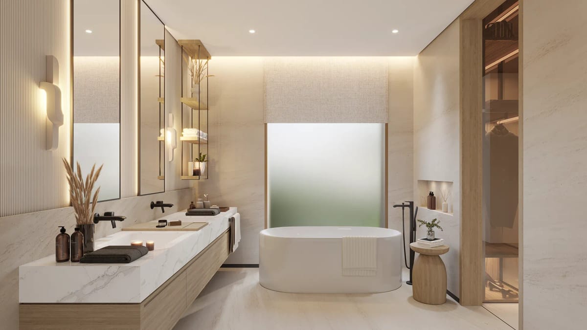 Master bathroom with a freestanding bath, stone vanity and a walk-through dressing room.
